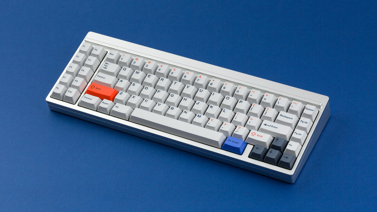  Cherry Industrial Keys on a silver keyboard 