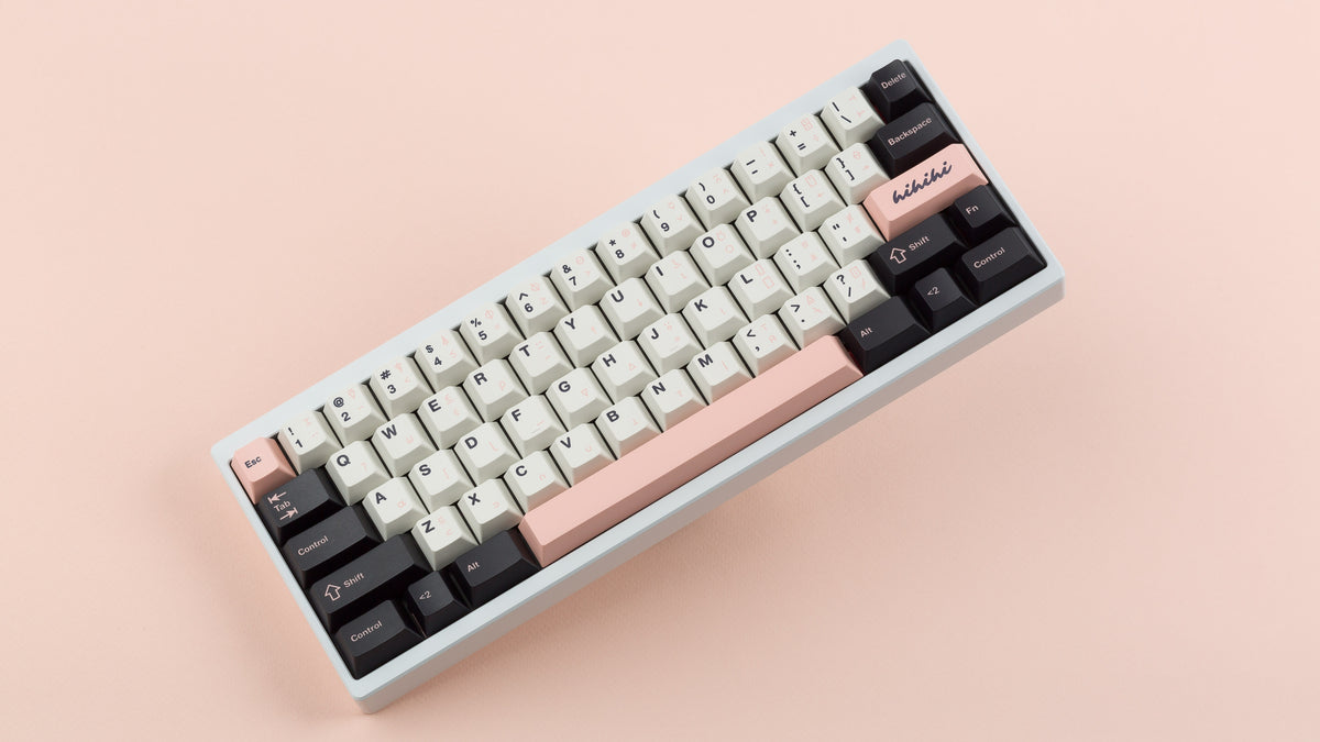  Cherry Olivia on a white keyboard angled 