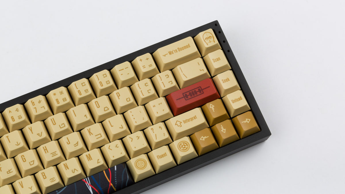  C-3PO keycaps on a black NK65 zoomed in on the right 