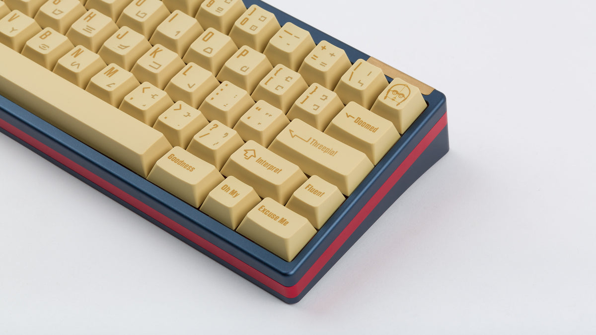  C-3PO keycaps on a blue keyboard zoomed in on the right 