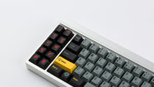 Load image into Gallery viewer, K-2SO on a silver keyboard zoomed in on the left