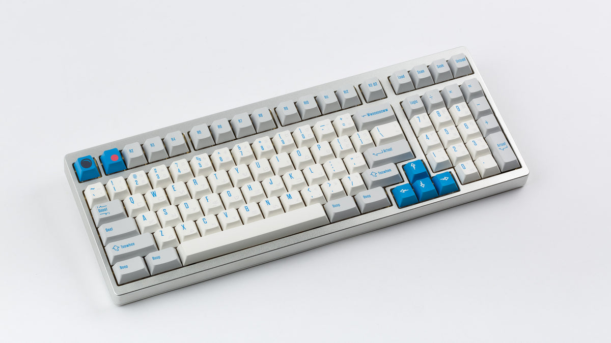  R2-D2 keycaps on a silver keyboard 