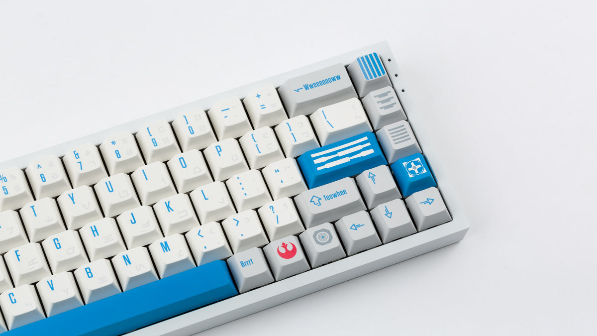  R2-D2 keycaps on a white NK65 zoomed in on the right 