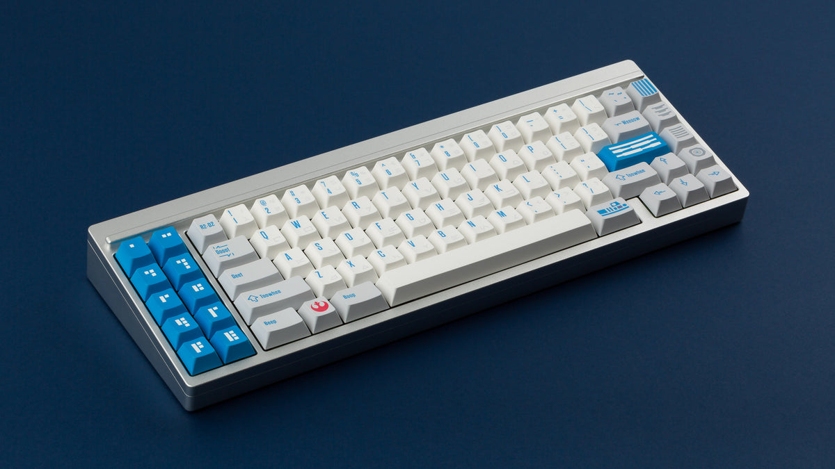  R2-D2 keycaps on a silver keyboard 