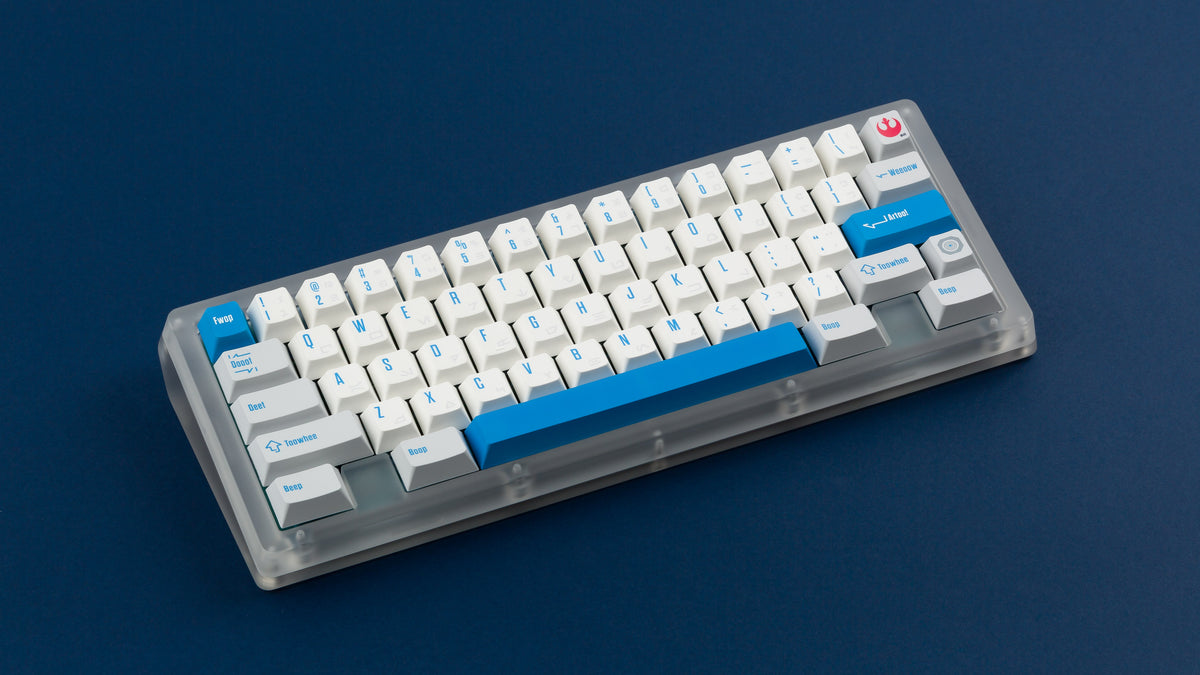  R2-D2 keycaps on a translucent keyboard 