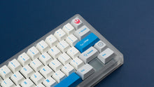 Load image into Gallery viewer, R2-D2 keycaps on a translucent keyboard zoomed in on the right