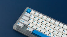 Load image into Gallery viewer, R2-D2 keycaps on a translucent keyboard zoomed in on the left