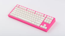 Load image into Gallery viewer, TFUE Keycaps on a pink NK87