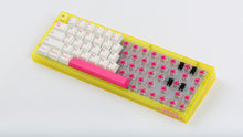 Load image into Gallery viewer, yellow tfue edition case with keycaps with switches exposed