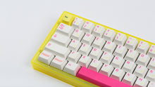 Load image into Gallery viewer, yellow tfue edition case with keycaps left side