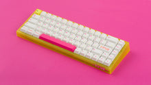 Load image into Gallery viewer, yellow tfue edition case with keycaps angled