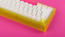 Load image into Gallery viewer, yellow tfue edition case with keycaps back view left sid