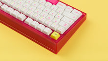 Load image into Gallery viewer, pink tfue themed keyboard with tfue keycaps back view of left side on yellow background