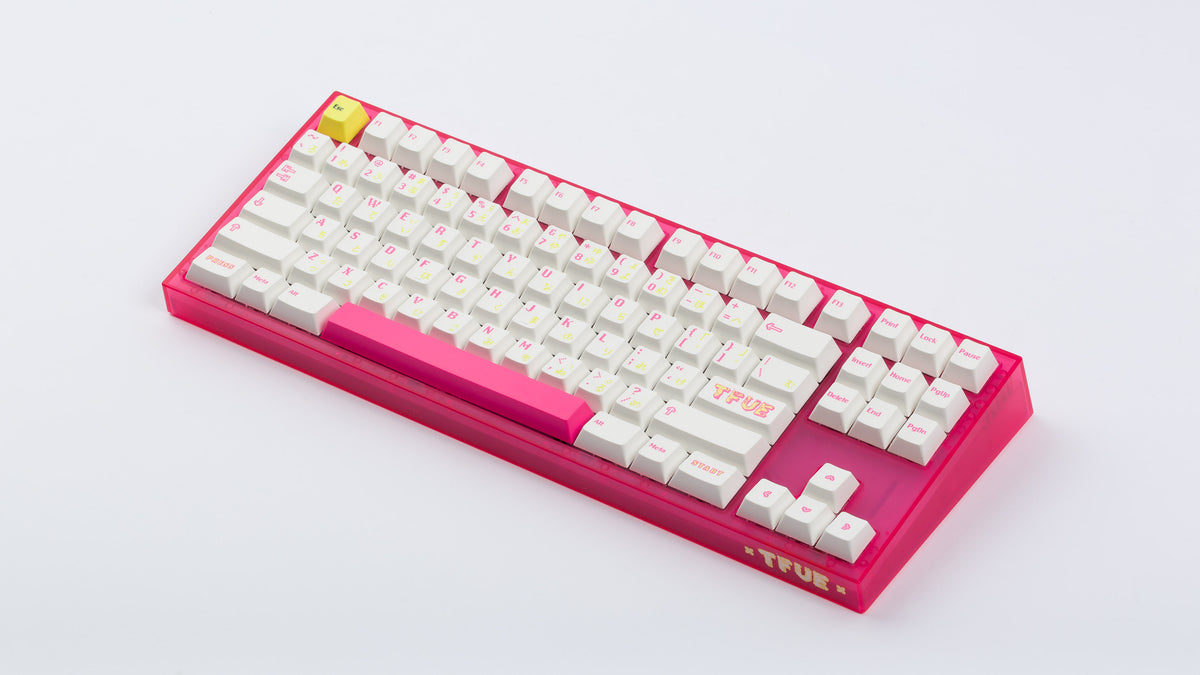  pink tfue themed keyboard with tfue keycaps angled to right 