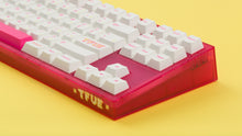 Load image into Gallery viewer, pink tfue themed keyboard with tfue keycaps yellow background right side close up