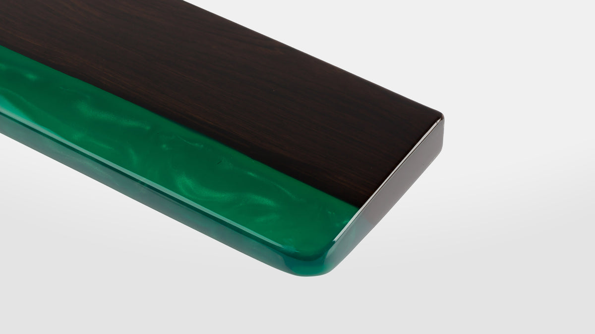  angled closeup of large green wrist rest 