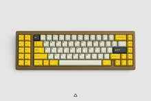 Load image into Gallery viewer, GMK CYL Serika 2 on a brownish gold keyboard centered
